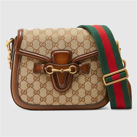 gucci web canvas shoulder bag crean|Gucci shoulder bag luxury brand.